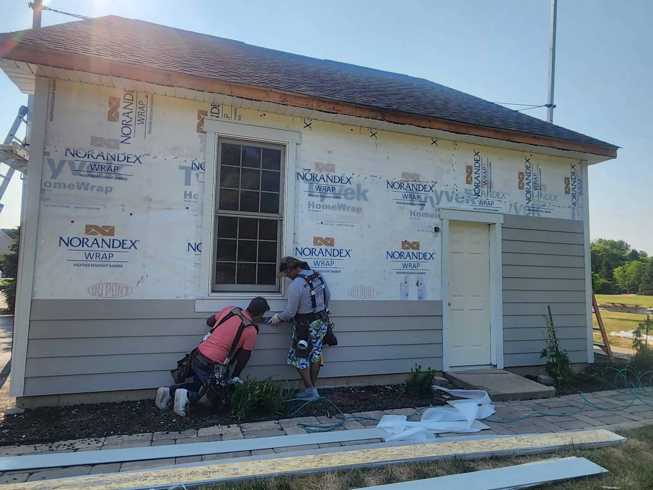 LP SmartSide siding being installed on a residential project