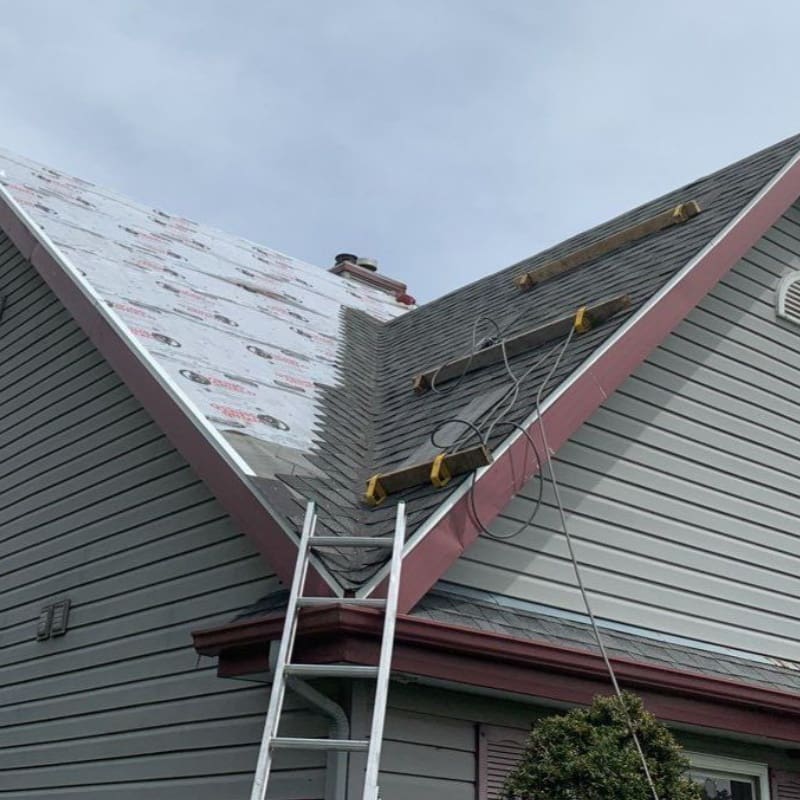 Harvard Roofer Harvard Roofer installing a new roof