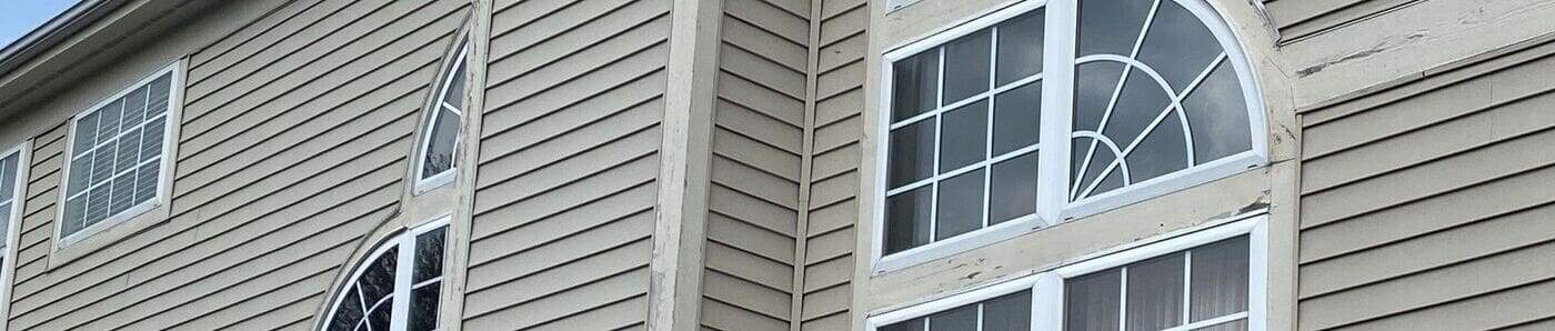 Window replacement installation in progress on Crystal Lake IL home