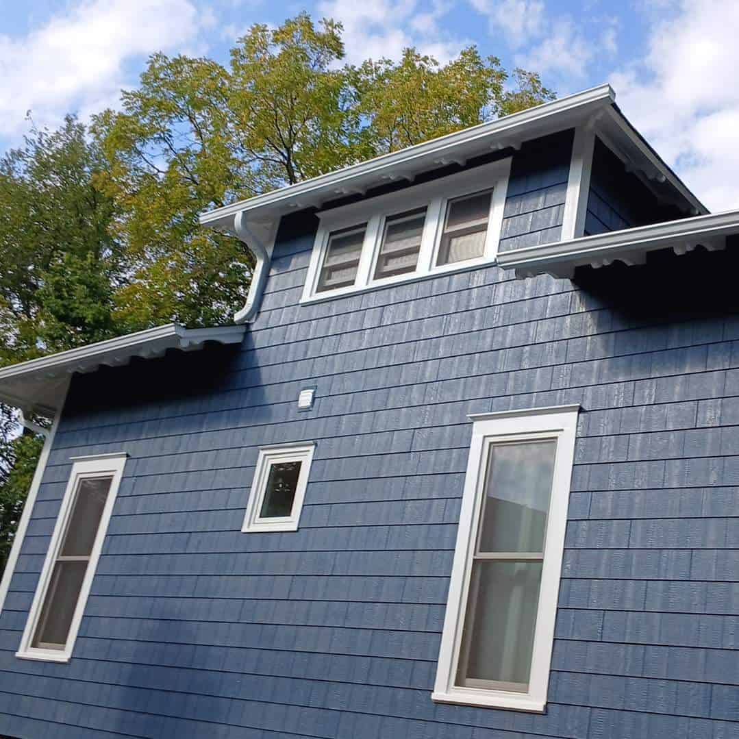 LP SmartSide shake siding in blue — deep cedar grain finish