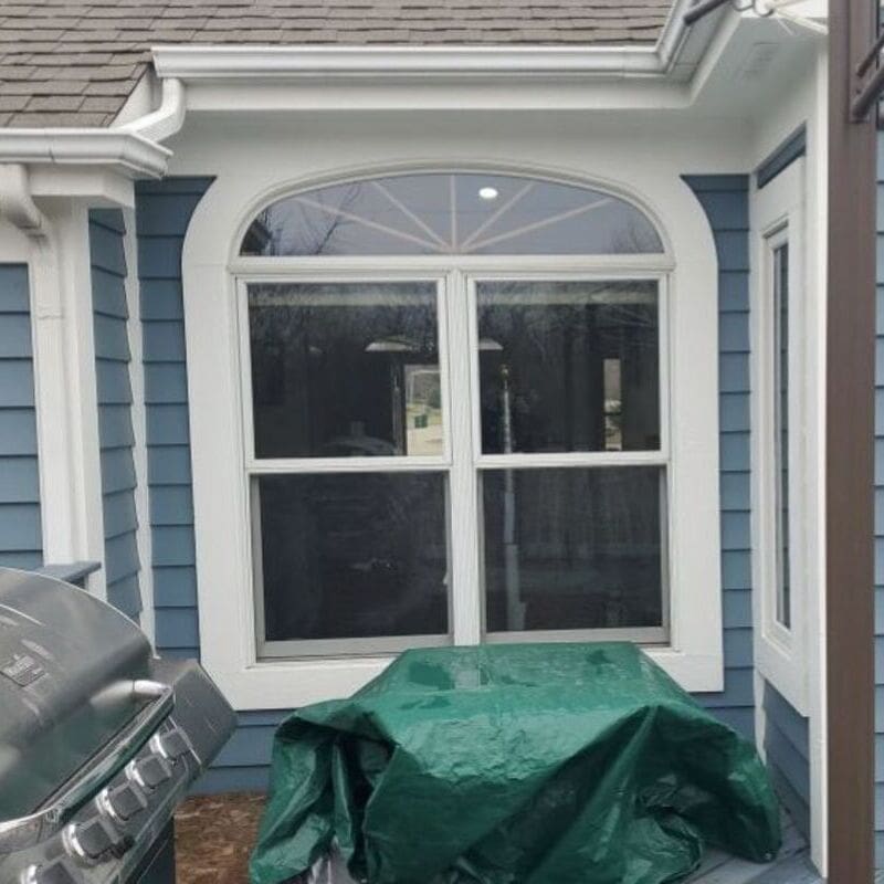 New Windows on a McHenry Home McHenry, Illinois window and door contractor installing energy-efficient windows on a suburban home.