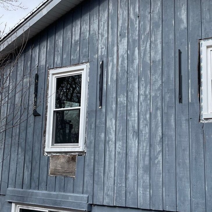 Siding replacement done right.  This home before we did our magic.