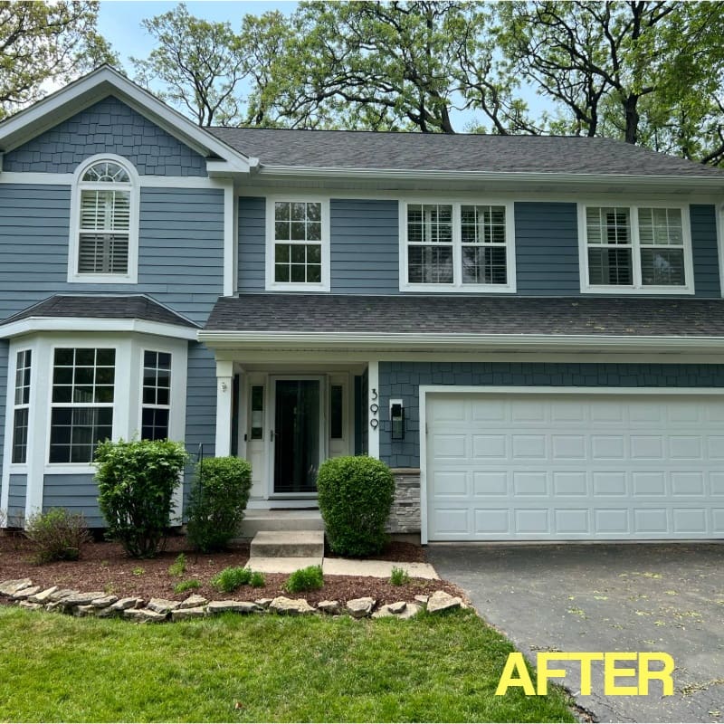 Hardie Shake Siding with Veretta Stone After photo of Hardie shake siding with Veretta stone accents