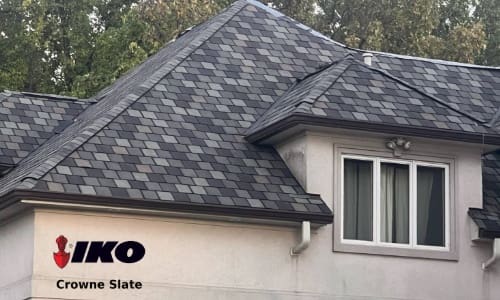 IKO Crowne Slate Roofing in Mchnery Il IKO Crowne Slate Shingles on a Mchnery Home.