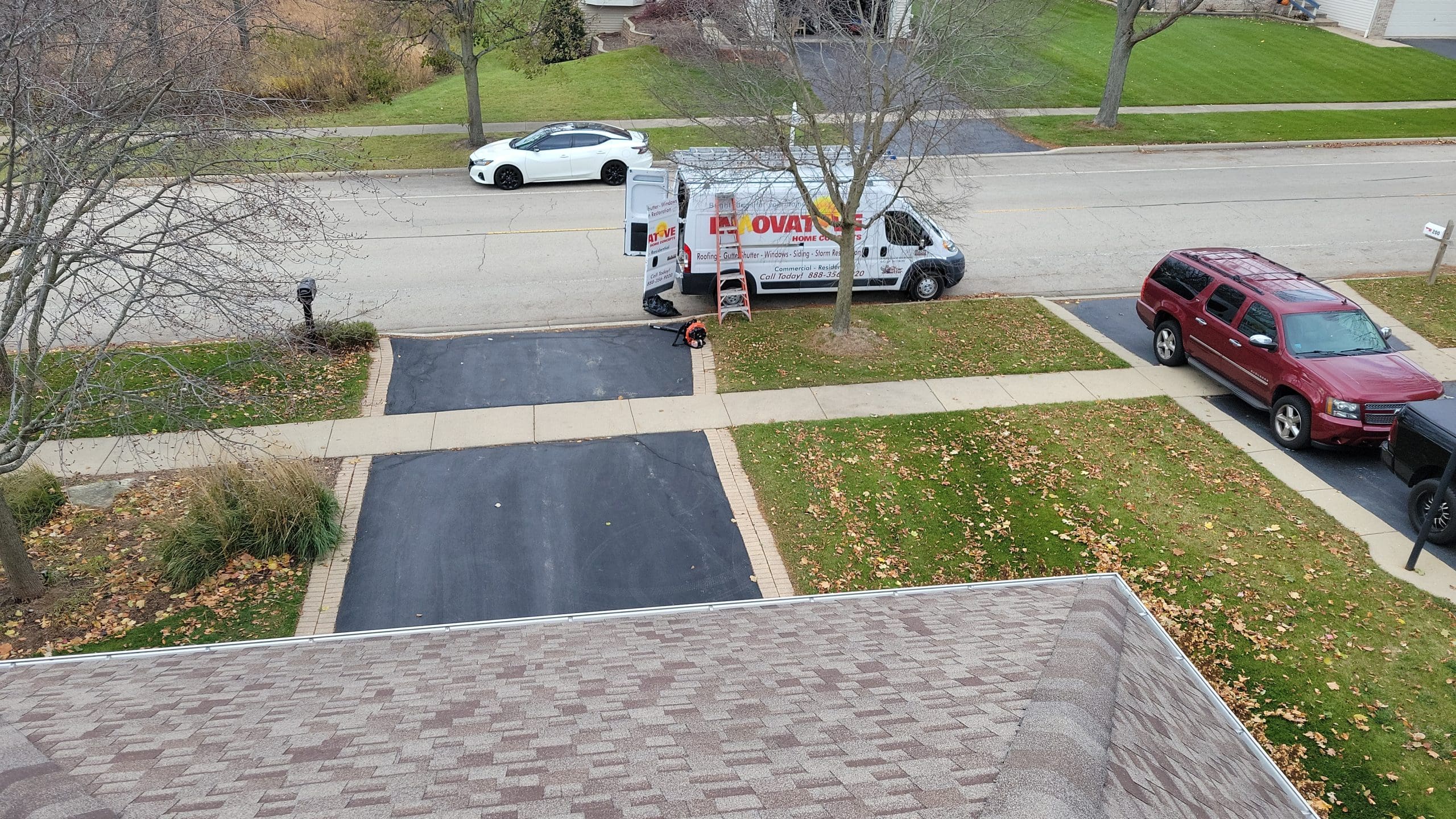 IHC crew at a job site performing exterior repair work