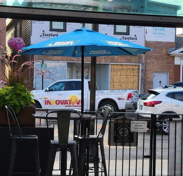 IHC crew performing commercial gutter repair work in McHenry County