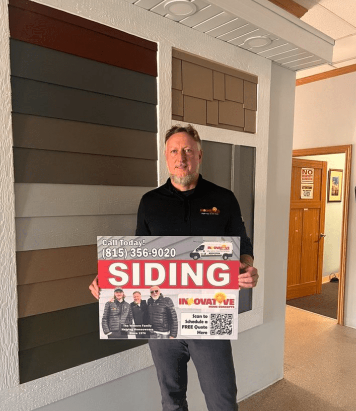 IHC owner at the James Hardie siding display in Crystal Lake showroom