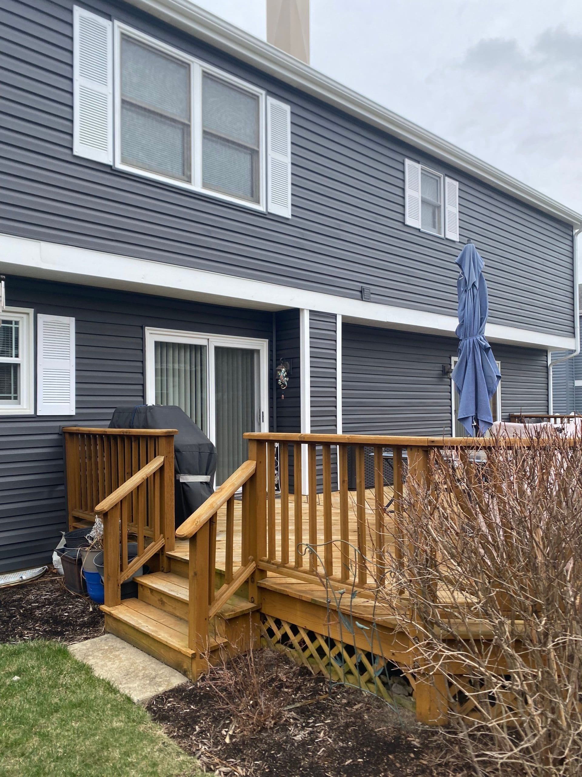Gray insulated vinyl siding on a residential exterior