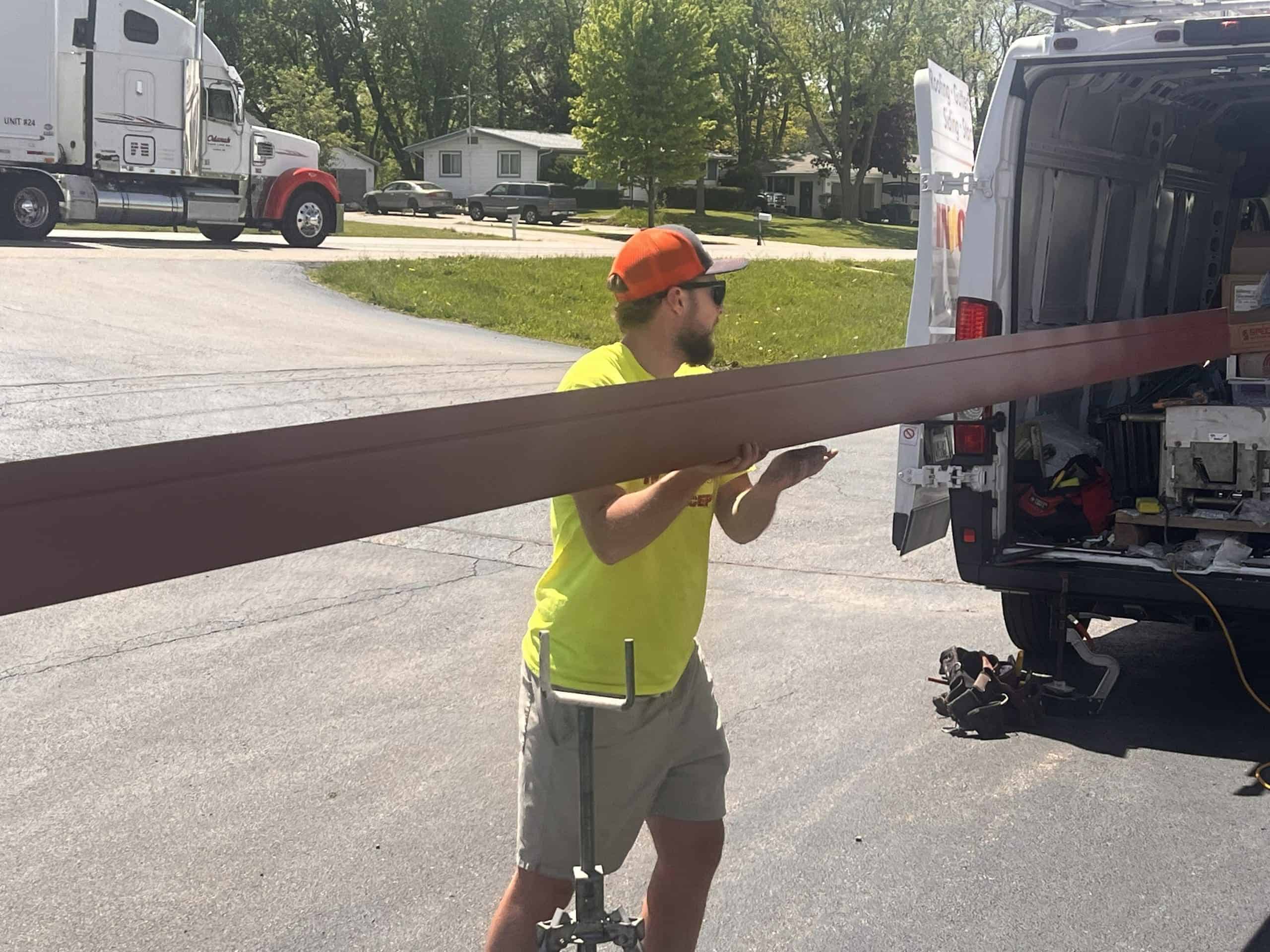 Gutter guard installation in progress on a McHenry County home