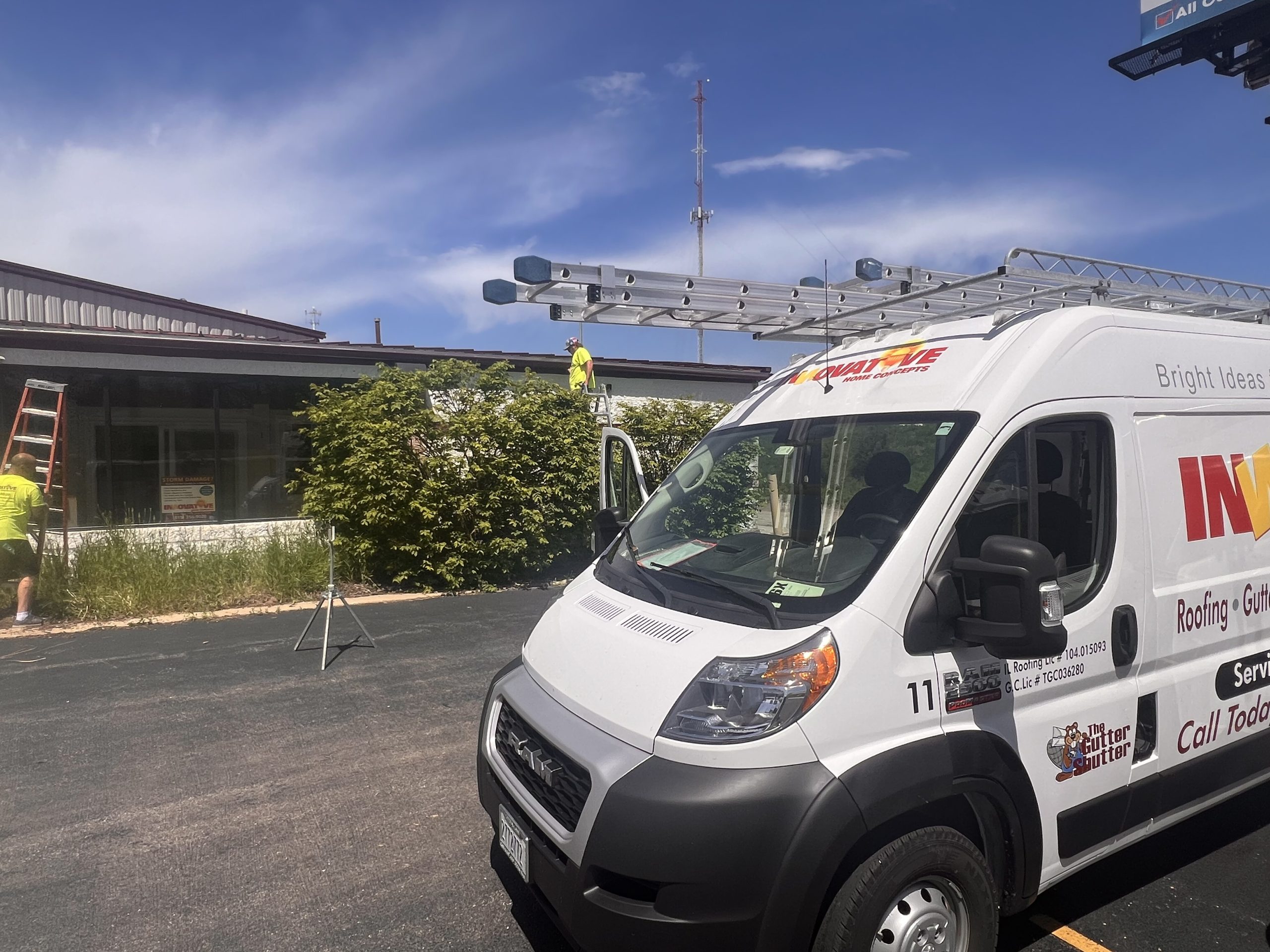 IHC commercial roofing professional at work on restoration project