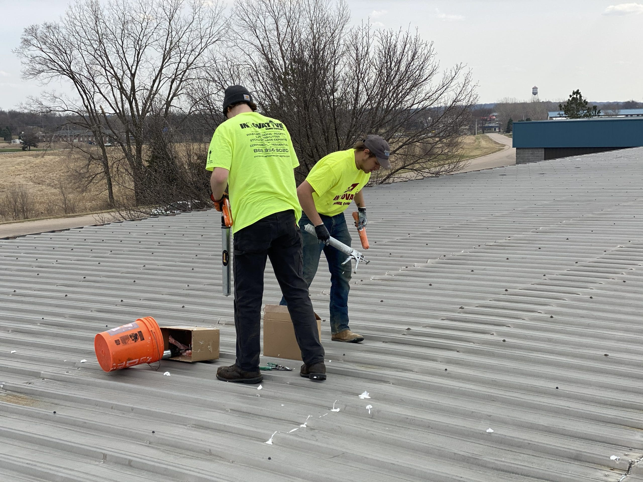 IHC crew performing commercial roof repair and maintenance
