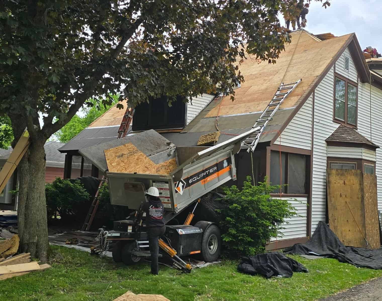 Roof tear-off with Equipter collecting debris - Innovative Home Concepts McHenry County