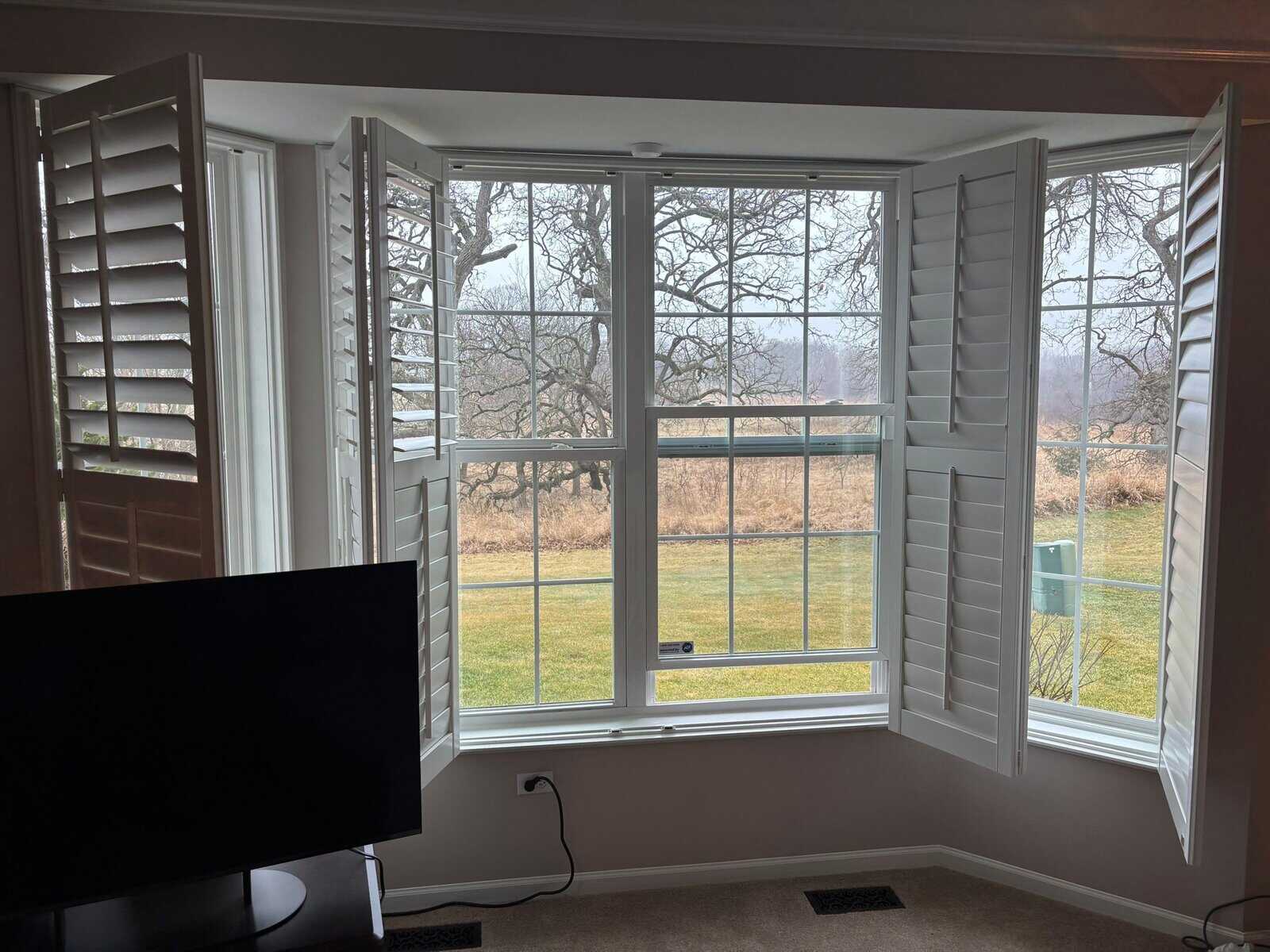 Andersen bay window with plantation shutters installed by IHC in Huntley IL