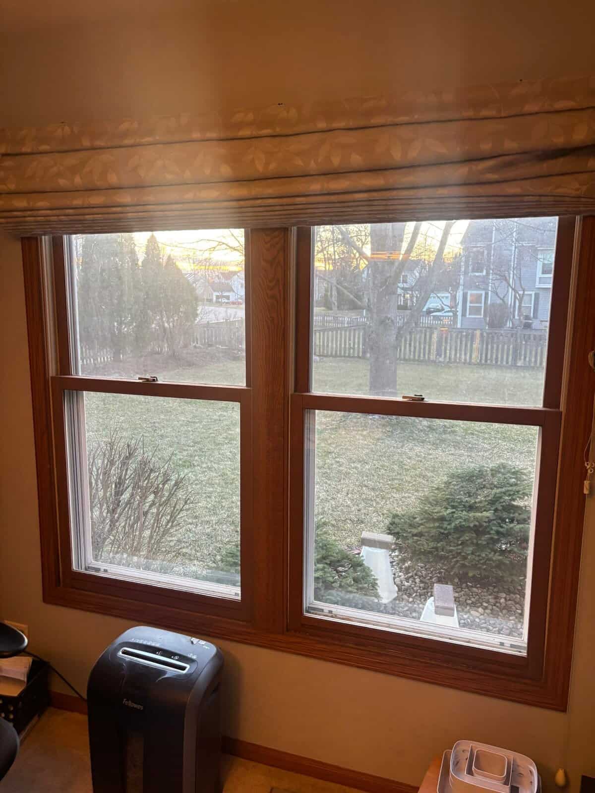 Andersen double-hung windows with stained wood interior in Crystal Lake home