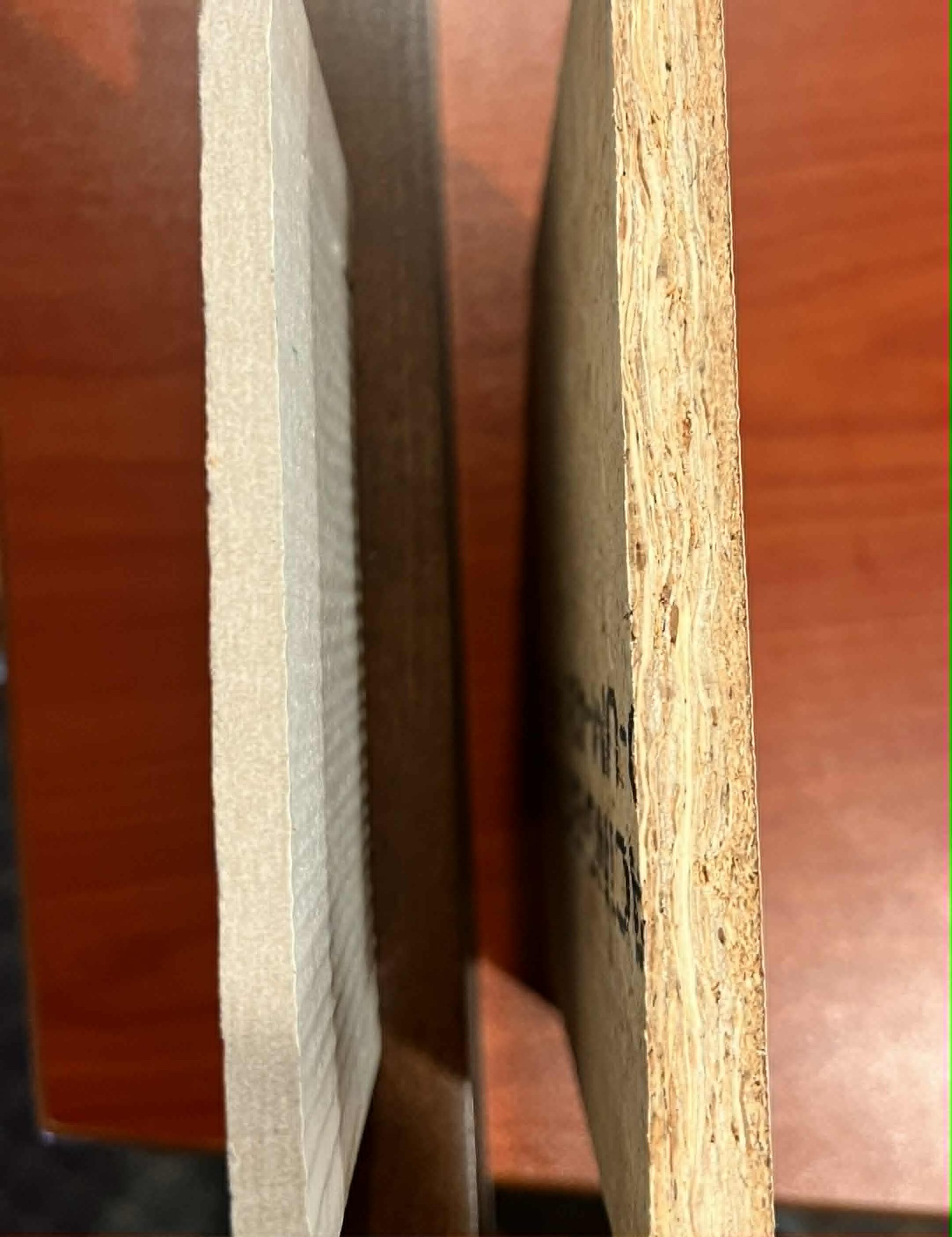 James Hardie fiber cement and LP SmartSide engineered wood cross sections side by side