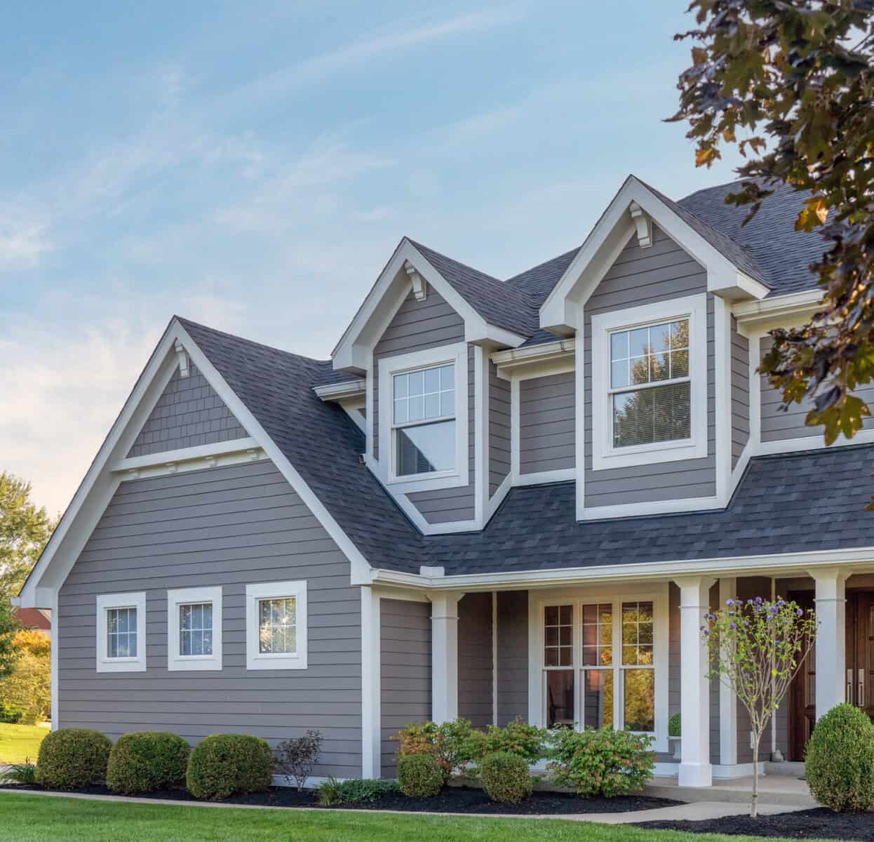 HardiePlank lap siding in Aged Pewter on a Victorian-style McHenry County home