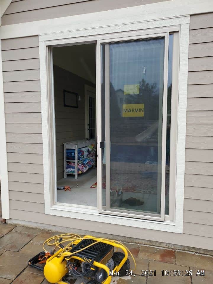 New Hardie siding and sliding glass door at Belfield Rd Crystal Lake