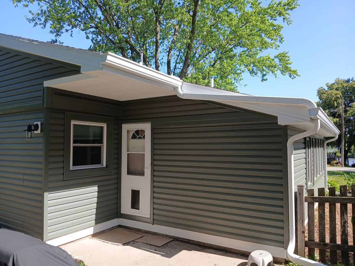 Completed vinyl siding with new trim — Wonder Lake IL