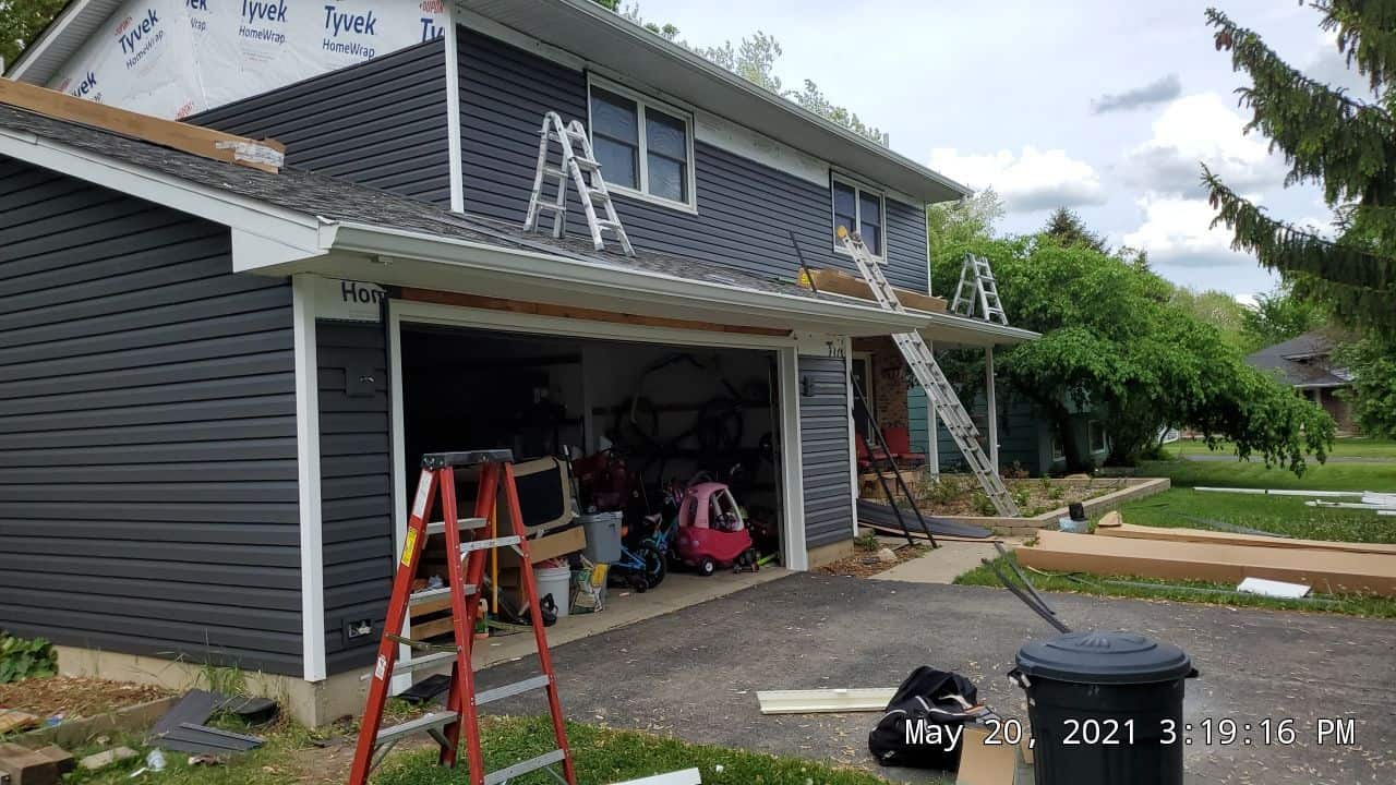 Vinyl siding installation in progress at Mark Ct, Woodstock IL