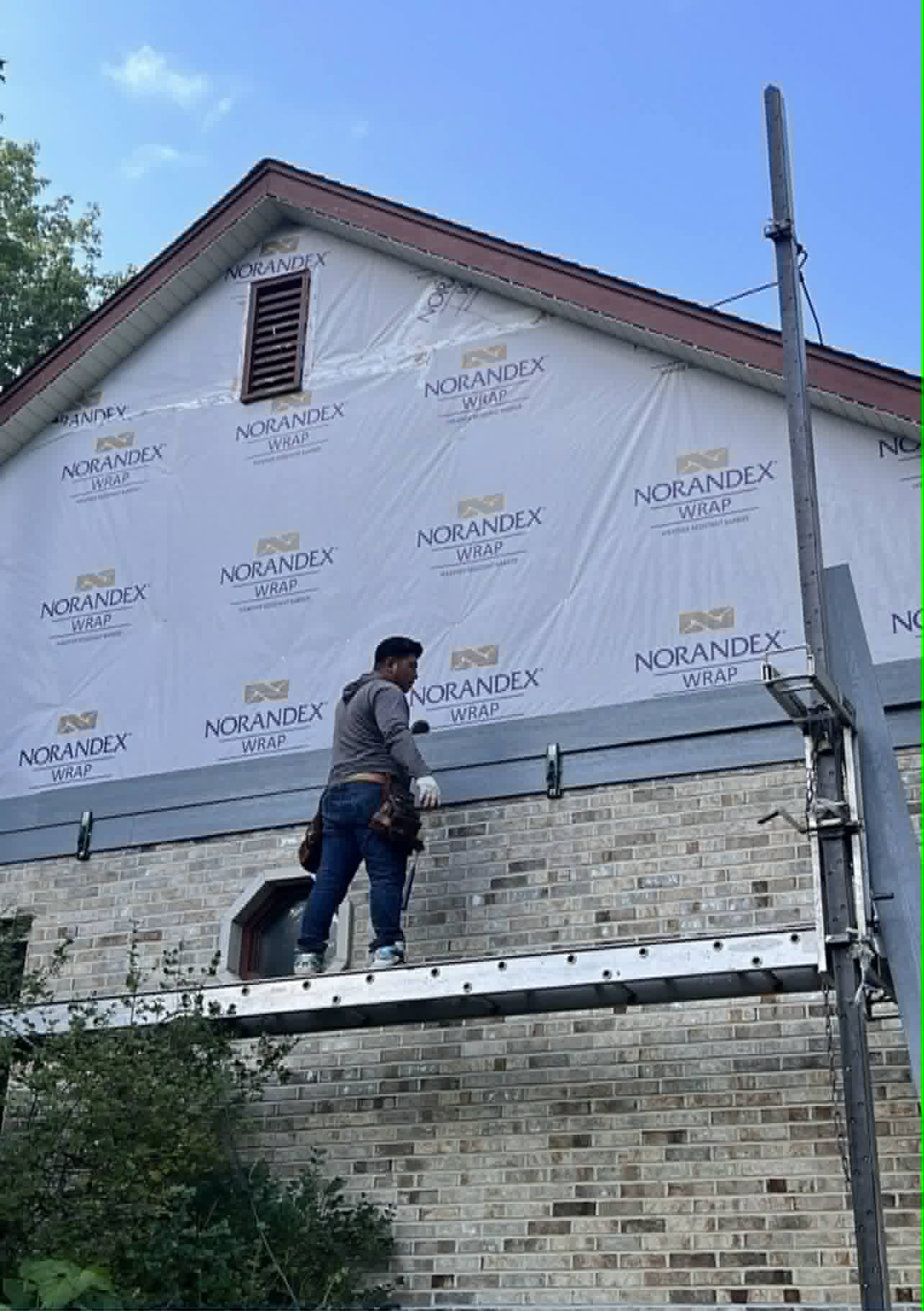 LP SmartSide being installed on McHenry County home