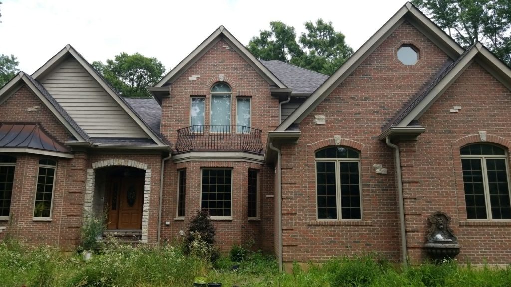 Crystal Lake home after GutterShutter full gutter and hood replacement system installation by IHC