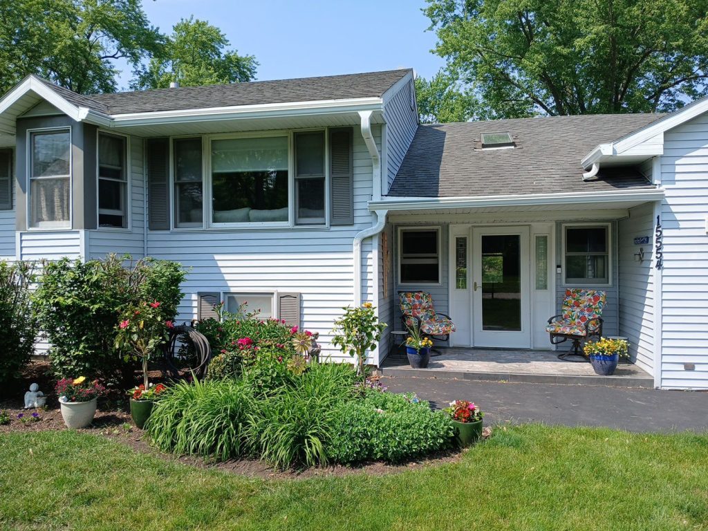 Libertyville IL home with new GutterShutter full-replacement aluminum gutter and integrated hood system installed by Innovative Home Concepts
