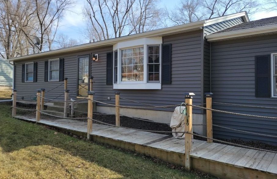 Osage Drive Wonder Lake IL after — new vinyl siding