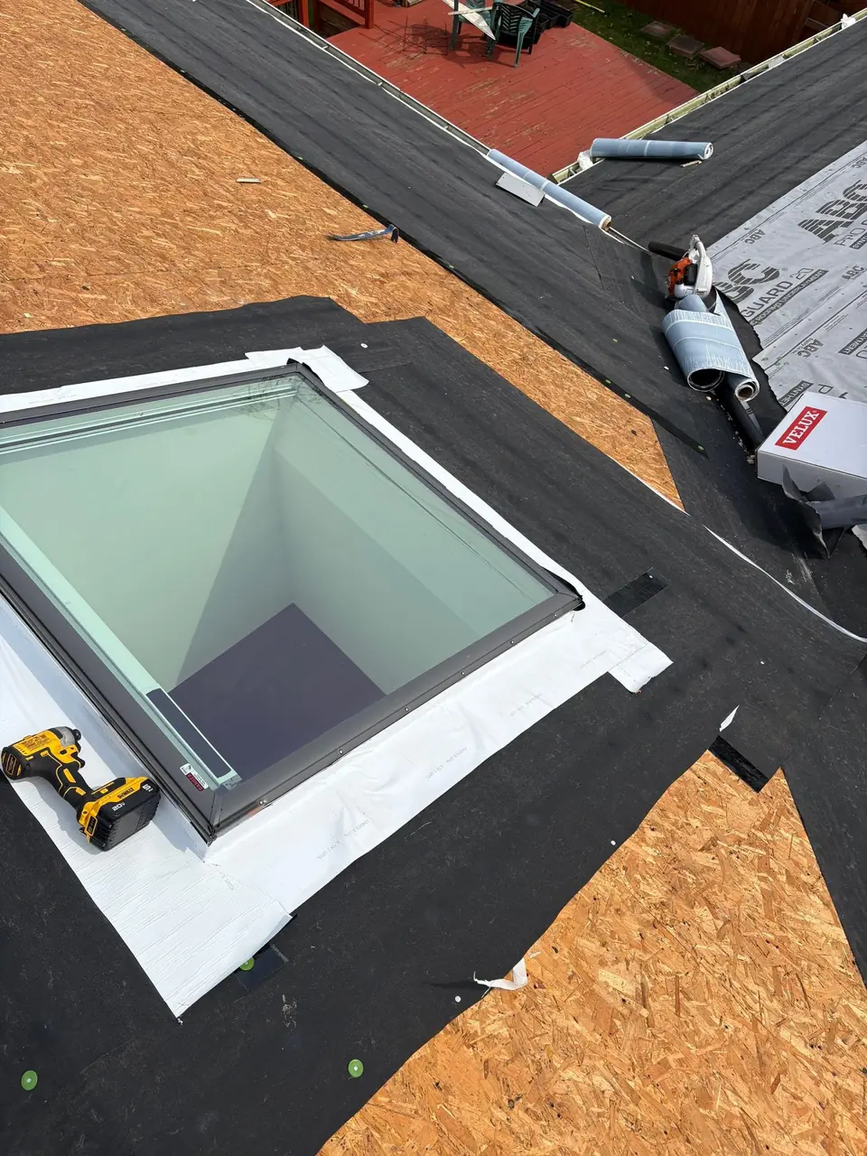 New Velux skylight being installed on a roof during replacement