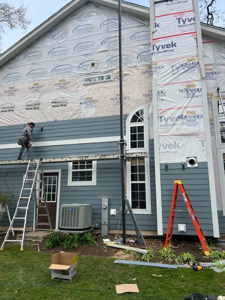 James Hardie fiber cement siding being installed by Innovative Home Concepts